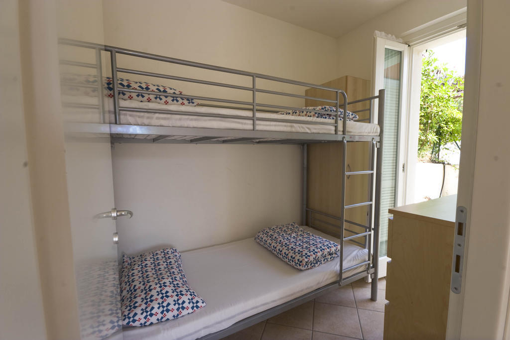 Aparthotel Amarenumana Pokoj fotografie